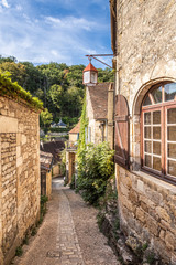 Pretty street in the medieval village of Beynac-et-Cazenac in the historic Perigord region of France