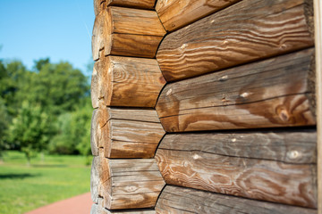 Angle logs close-up. Log wall of a wooden house