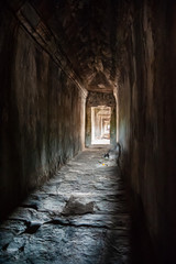 Fototapeta na wymiar Dark Hallway at Angkor Wat