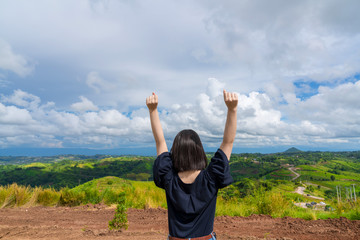 happy young cute Asian Japanese girl backpacker woman hipster guiding  female travelling women backpacking at beautiful sky mountains scenery  park garden hiking Phu Thap Boek, Phetchabun, Thailand.