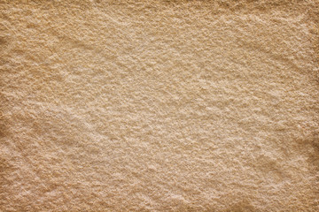 Sandstone natural texture light brown background , copy space