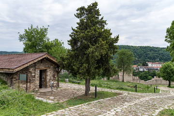Church and part of wall  of Trapezitsa fortress. Veliko Tarnovo in Bulgaria.