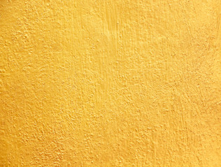 Gold concrete wall abstract old texture rough seamless patterns for yellow colorful background