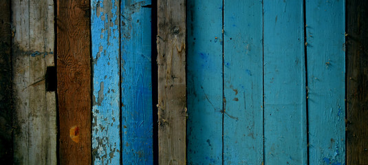 old boards with peeling blue paint, texture, background