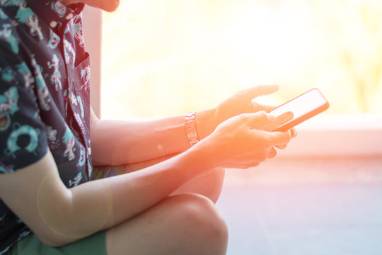 Freelance man using multichannel online network 5G technology internet tablet and laptop working in nature park during relax day time.Sunlight morning, work from anywhere life style concept.