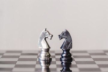 Chess figure in competition success play. strategy, management or leadership