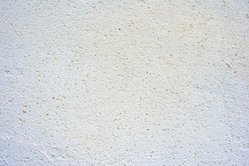 Texture of a concrete wall with cracks and scratches which can be used as a background
