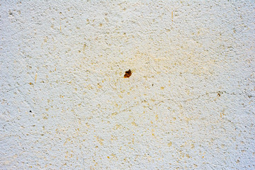 Texture of a concrete wall with cracks and scratches which can be used as a background