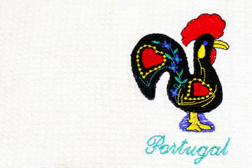 embroidered symbol of Portugal the rooster on white background