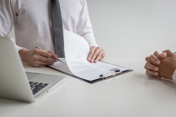 Fototapeta premium Executives are interviewing job applicants and preliminary background checks, candidates are talking about their past work experience, personal managers make hiring decisions.