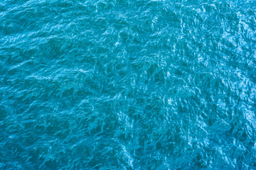 Blue river water background with medium sized waves