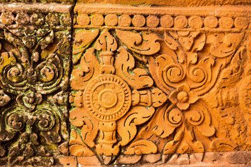 Art of pink sandstone carving of ancient Khmer architecture Phanom Rung Stone Castle Buriram Province, Thailand