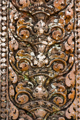 Art of pink sandstone carving of ancient Khmer architecture Phanom Rung Stone Castle Buriram Province, Thailand