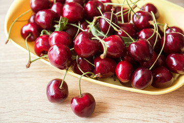 Red sweet cherry on a table