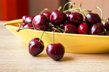 Red sweet cherry on a table