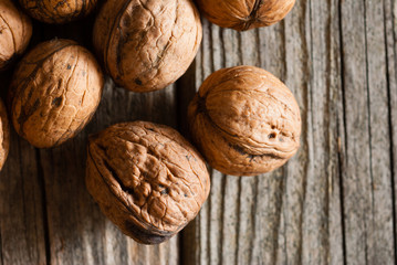 walnuts on old wooden table directly above