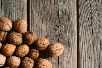 walnuts on old wooden table directly above