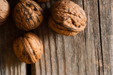 walnuts on old wooden table directly above