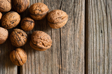 walnuts on old wooden table directly above