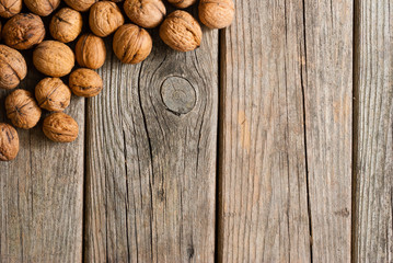 walnuts on old wooden table directly above