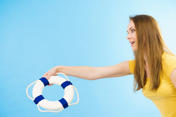 Girl holds life buoy rescue ring