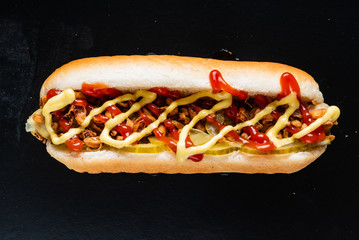 hot dog on the black background