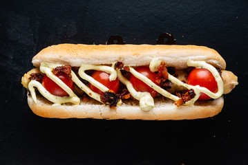 hot dog on the black background
