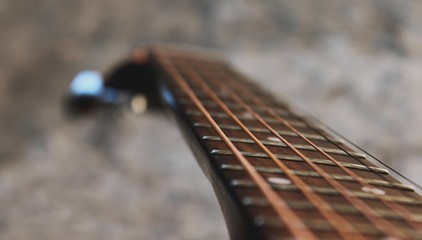 Acoustic guitar, close up background