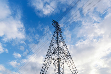 high voltage pole with blue sky 