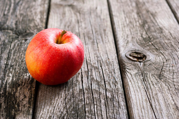 apple on old wood table