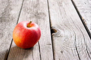 apple on old wood table
