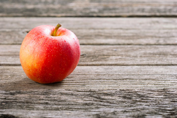 apple on old wood table