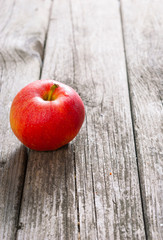 apple on old wood table