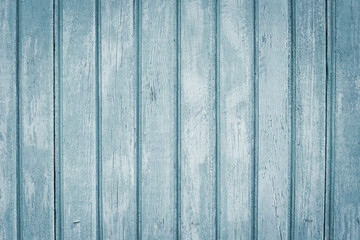 Striped grey wooden surface. Shabby light gray and blue fence with nails. Wood wall background, old planks, parquet, table. Vintage blue boards texture.