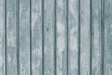 Shabby wooden fence. Gray surface of striped hardwood. Timber pattern, plank painted, light retro wood boards. Lumber background, carpentry rough texture.