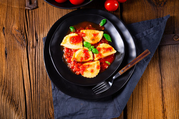 ravioli alla genovese with basil tomato sauce