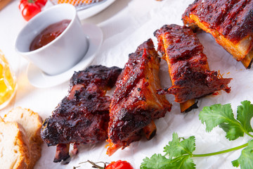 BBQ spare ribs from a charcoal grill