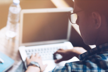 Stop wishing, start doing. Male freelancer is doing his work using laptop