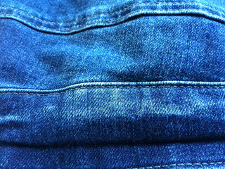 Naklejka premium close up of denim jeans as would be seen on a retail stack