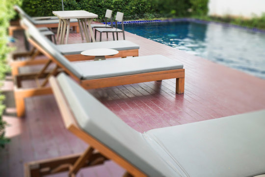Bench at swimming pool in the hotel