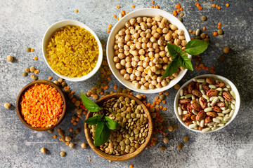 Healthy food, dieting, nutrition concept, vegan protein source. Raw of legumes (chickpeas, red...