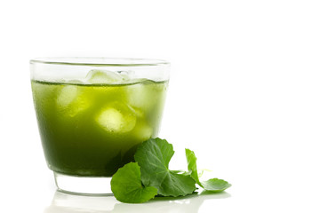 Fresh green Gotu kola, Centella asiatica leaf and juice on white background , Asiatic pennywort,...