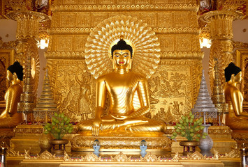 golden buddha image statue in temple