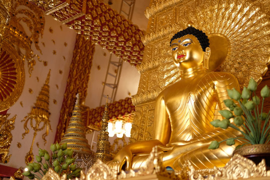 golden buddha image statue in temple