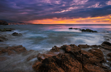 rocks and sea in sunset time