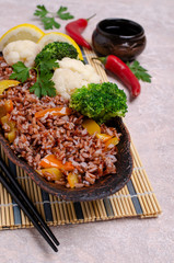 Unpolished red rice with vegetables
