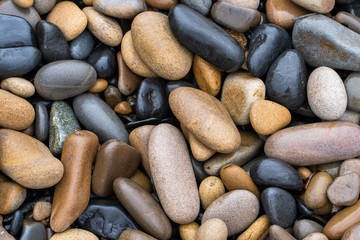 Fototapeta na wymiar Natural background. Image of wet big sea pebbles