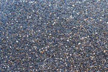 Natural background. Image of small wet sea pebbles