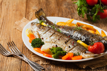 Grilled whole trout. Served with baked potatoes.
