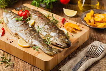 Grilled whole trout. Served with baked potatoes.